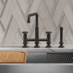 Color-Changing Industrial Bridge Kitchen Faucet with Side Sprayer and ColorSmart™ Technology in Matte Black / Grey