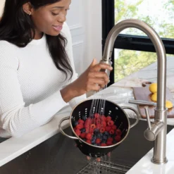 Single Handle Pull Down Kitchen Faucet with Deck Plate and Soap Dispenser in all-Brite Spot Free Stainless Steel