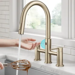 Touchless Sensor Bridge Kitchen Faucet with Pull-Down Sprayhead in Spot-Free Antique Champagne Bronze