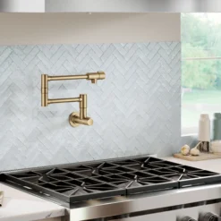 Wall Mount Pot Filler Kitchen Faucet with Retractable Arm in Spot-Free Brushed Brass