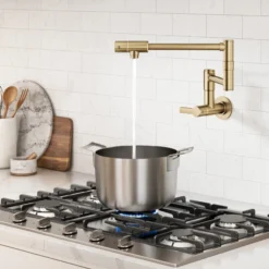 Wall Mount Pot Filler Kitchen Faucet with Retractable Arm in Spot-Free Brushed Brass