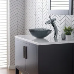 Waterfall Bathroom Faucet with Clear Black Glass Disk and Pop-Up Drain in Chrome