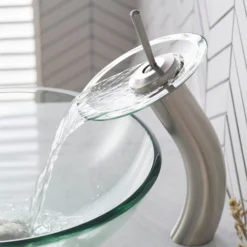 Waterfall Bathroom Faucet with Clear Glass Disk and Pop-Up Drain in Satin Nickel