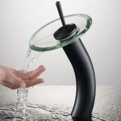 Waterfall Bathroom Faucet with Clear Glass Disk and Pop-Up Drain in Oil Rubbed Bronze