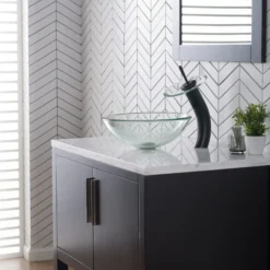 Waterfall Bathroom Faucet with Clear Glass Disk and Pop-Up Drain in Oil Rubbed Bronze