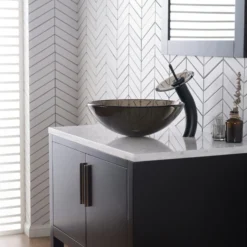 Waterfall Bathroom Faucet with Clear Brown Glass Disk and Pop-Up Drain in Oil Rubbed Bronze