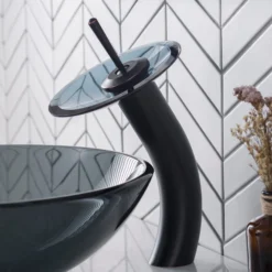 Waterfall Bathroom Faucet with Clear Black Glass Disk and Pop-Up Drain in Oil Rubbed Bronze