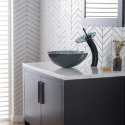 Waterfall Bathroom Faucet with Clear Black Glass Disk and Pop-Up Drain in Oil Rubbed Bronze