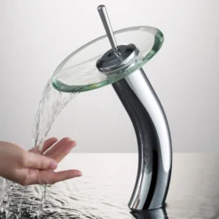 Waterfall Bathroom Faucet with Clear Glass Disk and Pop-Up Drain in Chrome